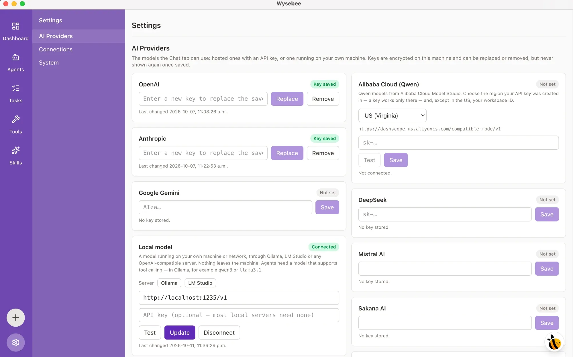 The Wysebee Settings screen, AI Providers tab. Cards for OpenAI and Anthropic show a saved key; Google Gemini, Alibaba Cloud (Qwen), DeepSeek, Mistral AI and Sakana AI are available but not set. A 'Local model' card is marked Connected, with a server toggle for Ollama or LM Studio and the address http://localhost:1235/v1, noting the API key is optional because most local servers need none.